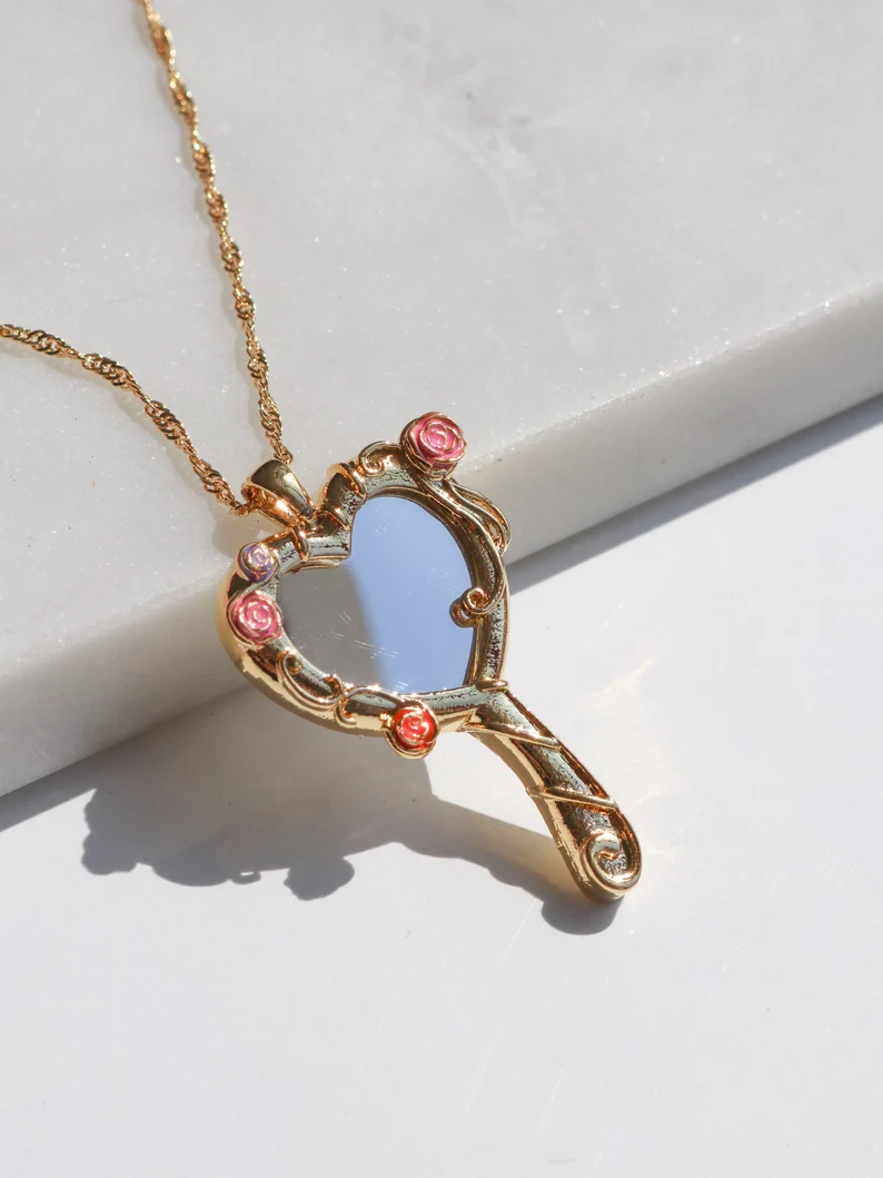Barbie and the Diamond Castle Princess Liana and Alexa Magic Mirror Heart Necklace