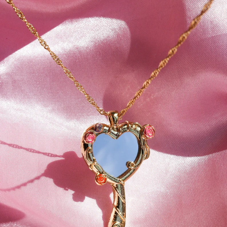 Barbie and the Diamond Castle Princess Liana and Alexa Magic Mirror Heart Necklace